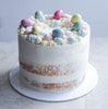 Vegane Ostertorte mit bunten Marzipaneiern