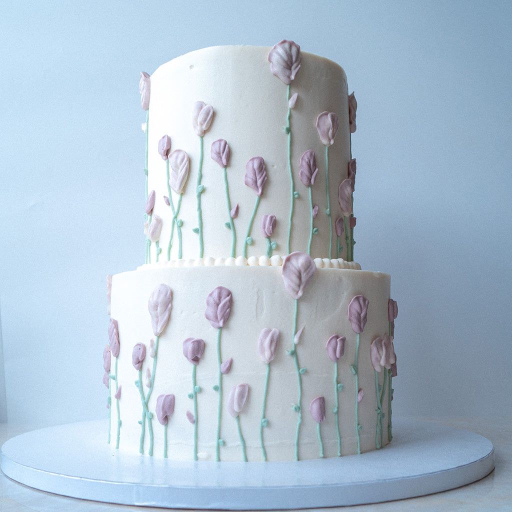 Vegane Hochzeitstorte flieder weiß